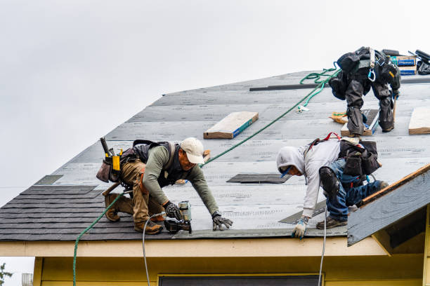 Professional Gutter Installation technician working in Pepperell, MA